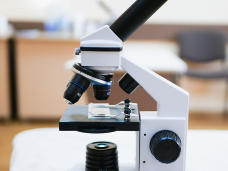 Medical microscope. Large view. Black and white. Laboratory microscope stereo eyepiece in the...