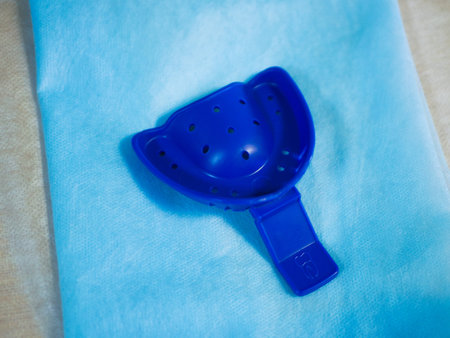 plastic dental braces. of blue color. view from above. jaw holder. from compression.