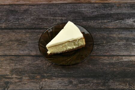 Cheesecake on a dark wooden background. view from aboveの写真素材