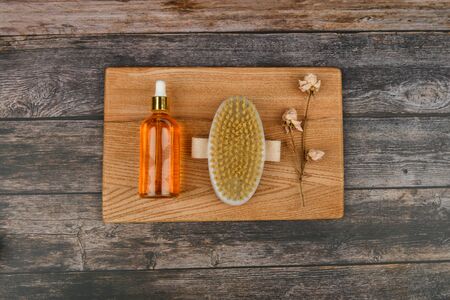 Skin care products. Anti-cellulite massage brushes. view from above. Massage brush. On a pink background. Accessories for massage. Flatley. eco care concept. Skin care products on whiteの写真素材