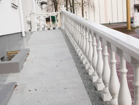 white railing. Beautiful vintage white concrete balcony railing