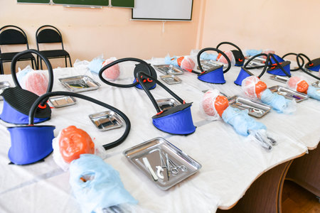 classroom for tracheotomy. head for tracheotomy practice. Training class on tracheotomy. children...