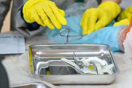 Future young surgeons. Interest in medicine in children. Children in medical gowns. Medical training. KHARKOV, UKRAINE - JANUARY 20, 2020.のeditorial素材