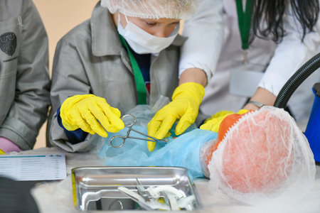 Young boy doctor. Interest in medicine in children. Children in medical coats. Medical training....