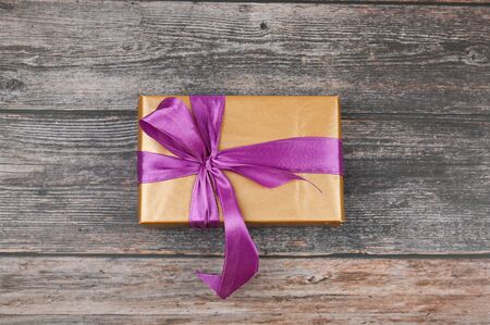 Gift box over wood with copy space. Flat lay. Top view.の写真素材