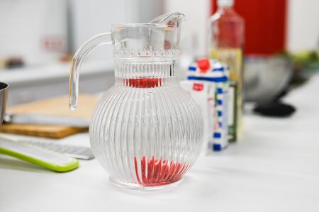 jug with water and fruits. healthy drink.の写真素材