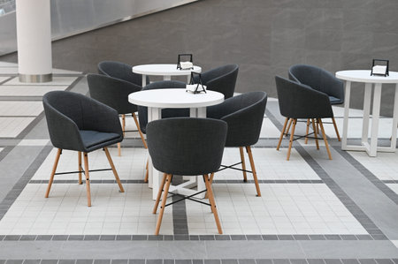 Chairs with a table in the mall. Chairs and table in shopping mall