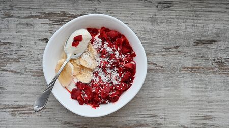 Porridge with strawberries and bananas.の写真素材