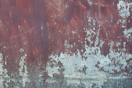 old orange metal wall in red.