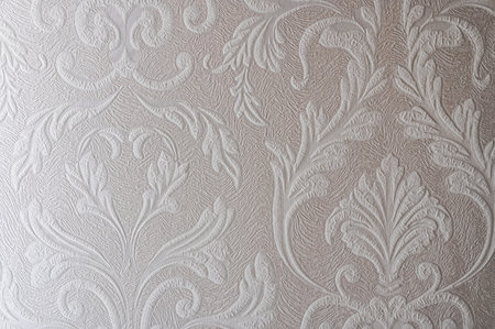 texture of white wallpaper with a pattern.