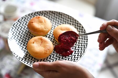 Cheese pastries in a black and white plate.の写真素材