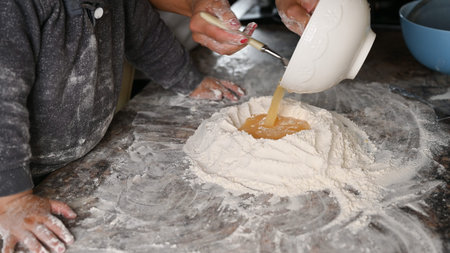 mom teaches to bake dough at home. High quality photo