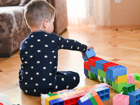 The child independently plays in the designer close-up.の写真素材