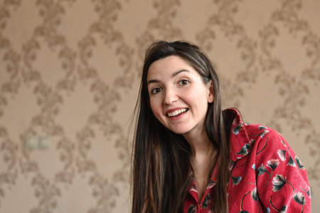 Girl surprised smiling looking at the camera