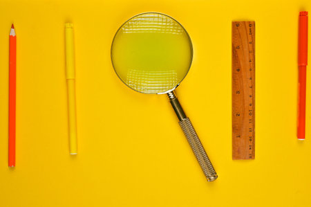 school supplies on a yellow background. High quality photoの写真素材