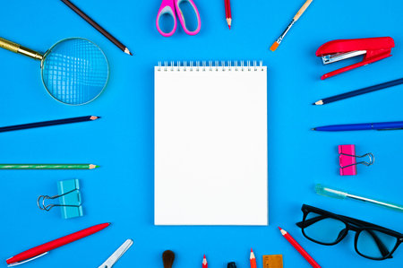 school supplies on a blue background
