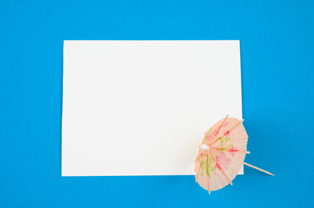 flat lay umbrella on white sheet