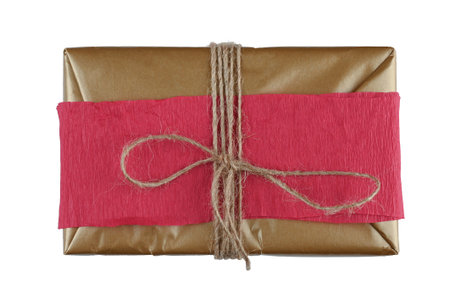 Brown gift wrap with tied rope on isolated background