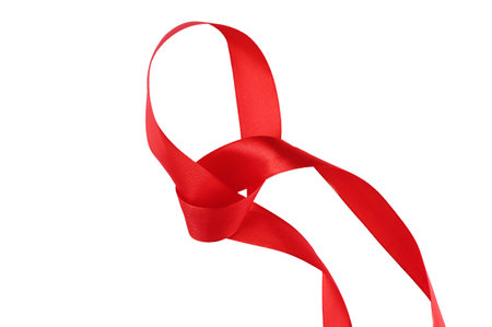 intertwined red ribbon separating white background
