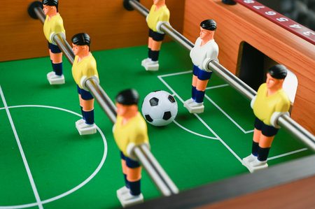 mini football with players and ball, close-up. High quality photo
