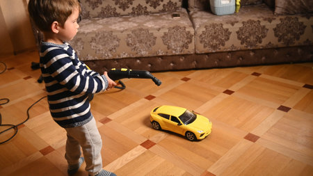 The child disinfects toys. Cleaning of children's toys. High quality photoの写真素材