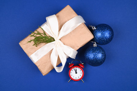 Blue Christmas balls with gift wrapping on a blue background. High quality photoの写真素材