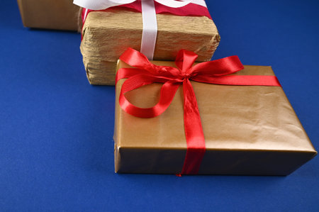 gift wrapping on blue background. High quality photo
