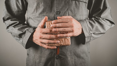 man hugs a gift, close-up. hug. High quality photoの写真素材