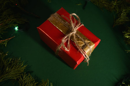 new year gift on dark green christmas backgroundの写真素材