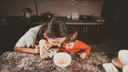 Cooking child and mother together. High quality photoの写真素材