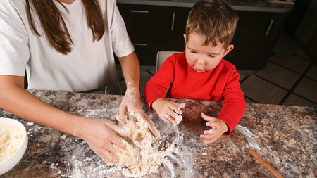 Cooking mother and baby from dough. High quality photo