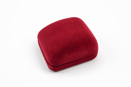 Dark burgundy jewelry box, on an isolated white background. High quality photo