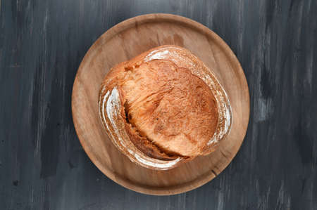 homemade bread on a dark wood. High quality photoの写真素材