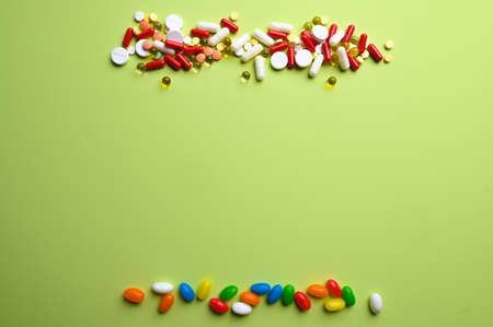 Vitamins vs medicine. Unhealthy food and health problems. Health care concept. High quality photoの写真素材