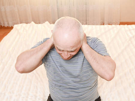elderly man with neck pain.の写真素材