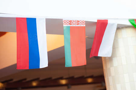 Russian, Belarusian and Polish flags.の写真素材