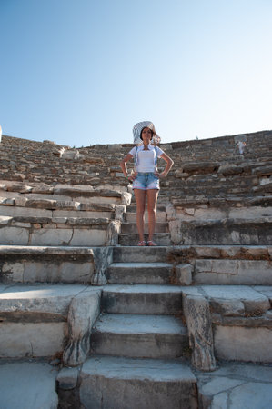 Girl tourist on the background of ancient buildings.の写真素材