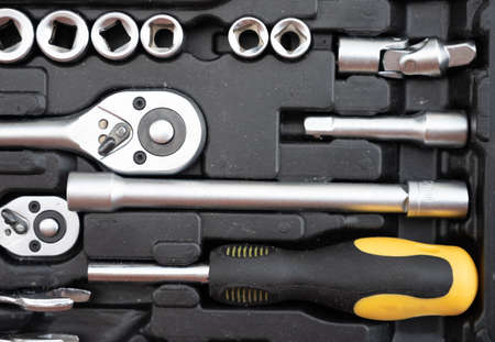 A set of black and yellow tools.の写真素材