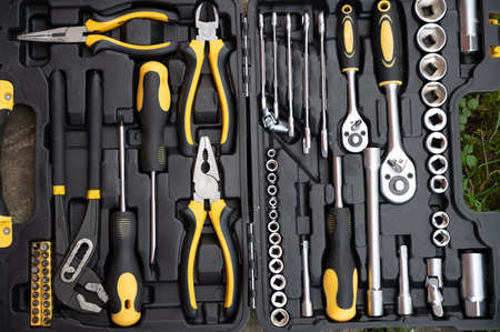A set of black and yellow tools.の写真素材