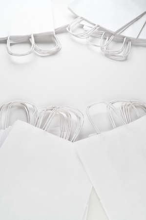 Stack of white paper bags on white background. High quality photoの写真素材