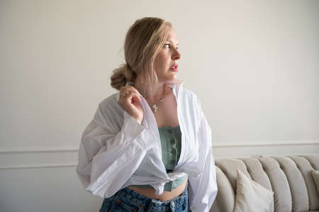 Portrait of a woman with a white shirt.の写真素材