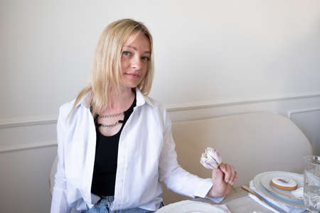 Portrait of a woman with a white shirt.の写真素材
