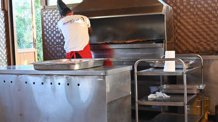 Minsk, Belarus - June 5, 2021: Iron kitchen for the chef.のeditorial素材