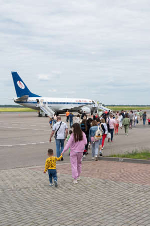 Minsk, Belarus - June 5, 2021: People board a Belarusian plane.のeditorial素材