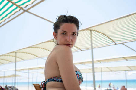 young woman enjoying on the beach.の写真素材