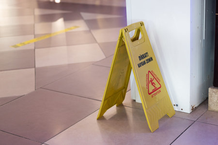 Slippery field warning sign. Wet floor.の写真素材