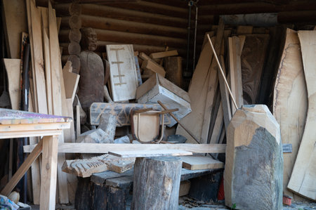 Boards and wood in a carpentry workshop outside. Timber wood blanks at diy workbench. Handcraft hobbyの写真素材