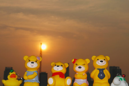 Teddy bear on the floor behind the sun.