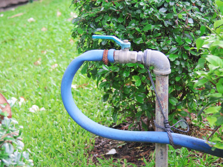 faucet. valve faucet. valve open. faucet selective focus. faucet in gardenの写真素材