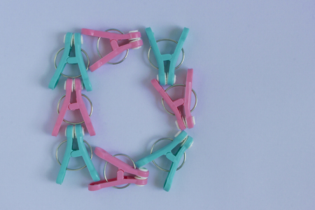set of clothespins on a white background.の写真素材